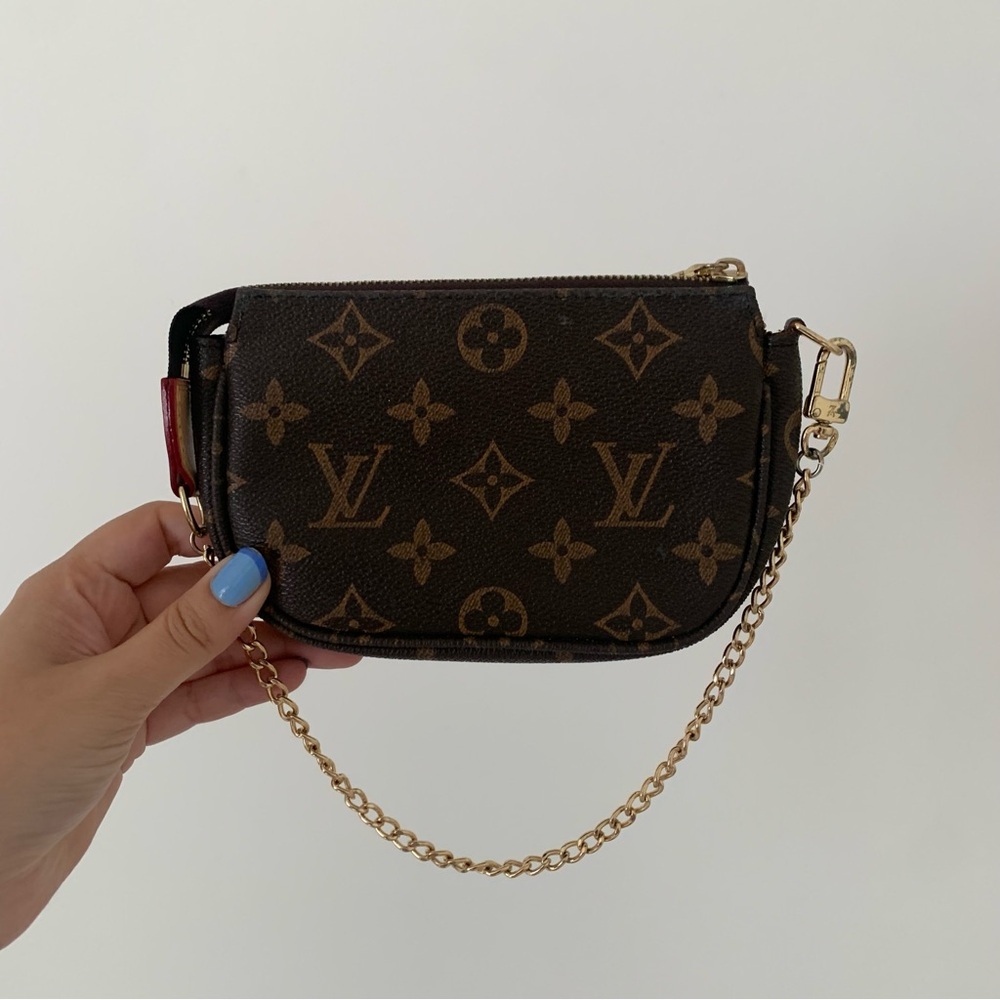 small monogrammed bag with gold strap